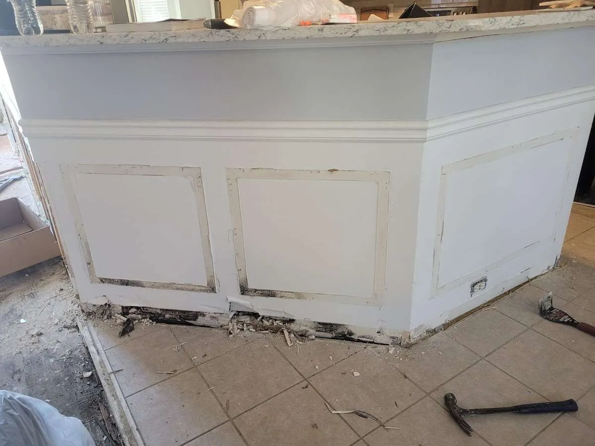 Water damage and mold on kitchen during Sewage Cleanup & Sanitation in Miami Springs